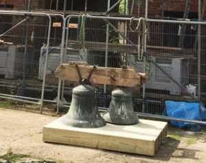 As part of the restoration project on the Clock Tower at Rougham Hall, the two huge bells are lowered to the ground whilst repairs are made to the tower.